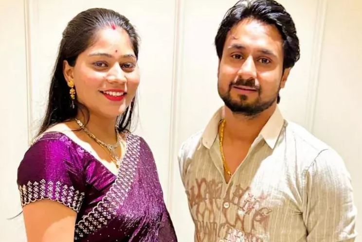 The couple on their wedding day (stock couple image if actual isn't available)
